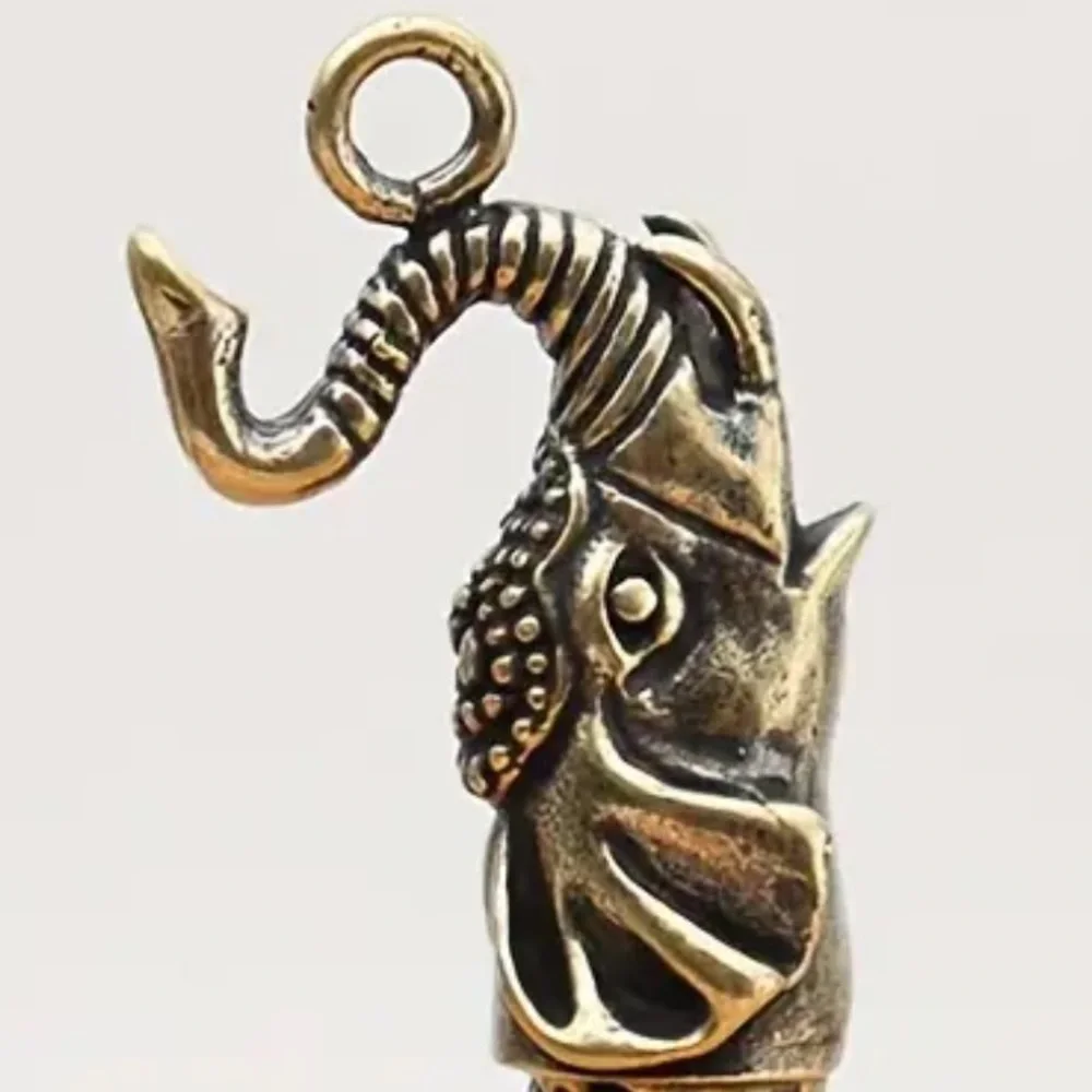Vintage brass elephant whistle pendant